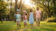 © Lacobus - Happy family enjoying Easter egg hunt in sunny forest together