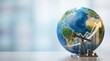© Mariya Sorvacheva - Globe depicting continents with an oil pump jack and upward trend graph symbolizing the global oil crisis and its economic impact on energy markets