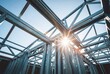 © Meow Creations - Looking up through light gauge steel framing of a new building with bright sunburst