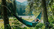 © olezzo - Young female hiker relaxing in a hammock by a crystal clear mountain lake. Woman resting after trekking during summer vacation, solo travel and outdoor leisure concept.