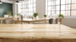 © TAO - A close-up of an empty wooden table, with a blurred office space and windows in the background, for product display or presentation