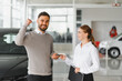 © Serhii - Happy man getting car keys from salesperson