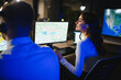 © Serhii - Dispatcher team analyzing map data during night shift