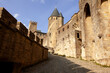© Almu Zambrana/Stocksy - Medieval Towers Along Carcassonne Walls