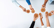 © InfiniteFlow - This image showcases a collaborative effort where diverse hands hold gears, symbolizing innovative ideas and strategic leadership essential for successful teamwork. Amity
