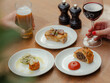 © Andrew Thomas/Stocksy - Bar snacks