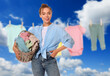 © New Africa - Happy woman with laundry basket near clothes drying outdoors