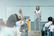 © EduLife Photos - Students Raising Hands in Classroom During Lecture