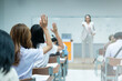 © EduLife Photos - Students Raising Hands in Classroom During Lecture