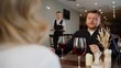 © Ruslan - Man on a restaurant date listening to his partner with a glass of red wine.