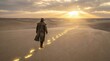 © Tin - A man walking in desert sand following God's footprint concept. A lone traveler walks through the serene desert at sunset.