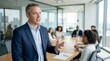 © TechVision Studio - Confident businessman speaking to team in a modern boardroom, gesturing with hands, blurred audience seated around a table, corporate meeting, business discussion, 100-200 chars