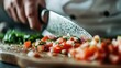 © Larisa AI - A chef's hands skillfully chopping fresh tomatoes with a sharp knife on a wooden board, a scene that embodies the art of cooking and the joy of culinary creativity.