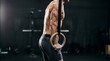 © MosquitoSlayer - Focused Athlete Training with Gymnastic Rings in Modern Gym Interior