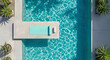 © petrovk - Stunning top view of a turquoise swimming pool with a concrete tanning ledge and a yoga mat for morning wellness.