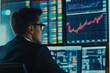 © Alberto Gonzalez  - Stockbroker analyzing real time data on multiple computer screens, monitoring market trends and making investment decisions