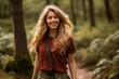 © nsit0108 - Young woman smiling, enjoying a refreshing walk in a natural forest environment