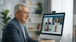 © Tonton1541 - Solo Agers Independent Living concept. Older man in a video conference call with colleagues on a desktop computer