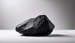 © Jaida - Black Rock Placed On A Plain White Background Nature Minimal Still Life