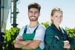 © auremar - man and woman standing near tractor outdoors