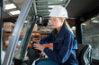 © auremar - woman in forklift operator
