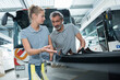 © auremar - two mechanic of buses talking
