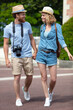 © auremar - beautiful couple walking in the street in summer