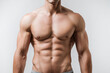 © AI_images - fit male torso with defined abs, frontal view, clean white studio background, balanced soft lighting highlighting core.