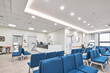 © Namsun - Clean modern hospital or clinic interior with patient beds and medical facility lighting.