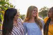 © Sabrina - Happy multiracial young women hugging each other outdoor during sunset time - Diverse ethnic people, girlfriends and lifestyle concept
