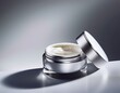 © Erik - elegant skincare cream jar with silver lid on clean background