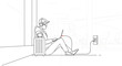 © design.idn - Young man with headphones and laptop charging battery.