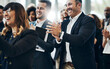 © peopleimages.com - Applause, meeting and team of business people in office for finance training, seminar or convention. Happy, clapping hands and audience of financial advisors with support for investment speech.