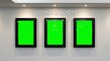 © Sri - Three empty digital screens displaying the words 'Coming Soon' on a white wall illuminated by spotlights, perfect for advertising new releases