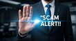 © Abdur - Man in suit holding hand up with scam alert text glowing stop