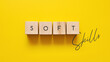 © fidaolga - Soft Skills Text On Wooden Blocks Business Concept On Yellow Background