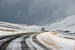 © Cavan Images - Iced road in snow storm conditions Iceland
