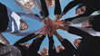 © Довидович Михаил - Students joining hands together in a circle, symbolizing unity and teamwork on a bright school day