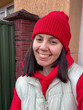 © phpetrunina14 - Winter street portrait of woman in red beanie and hoodie.