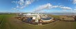 © AmazingAerialAgency - Grimsby, United Kingdom - 15 March 2026: Aerial view of the Tronox facility where industrial structures meet the earthy hues of surrounding fields under a vast, cloudy sky.