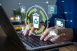 © Muhammad - Person typing on laptop with recycling and sustainability icons overlay