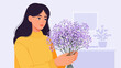 © Neda - Woman in yellow sweater holding a bouquet of small purple flowers