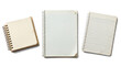 © Christine - group of three assorted notebooks, including a small unlined notepad and two lined spiral notebooks, isolated on a transparent background.