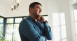 © peopleimages.com - Thinking, ideas and man in home with reflection, nostalgia or memory on weekend. Decision, relax and male person with choice or planning for break in apartment with daydreaming in living room.