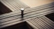 © Frimpong - Close-up of a Metal Nail Driven Through Wooden Planks.
