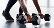 © peopleimages.com - Fitness, floor or hands with weights in gym, exercise equipment or challenge for muscle development. Sports club, bodybuilding or person with workout gear for strength training, dumbbells or active