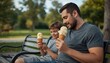 © Masaji - A man and a boy sitting on a park bench enjoying ice cream cones on a sunny day