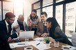 © peopleimages.com - Business people, talk and teamwork with laptop, meeting and budget review for tax strategy or online. Corporate, accountant and colleagues with tech for financial analysis, planning and collaboration