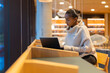 © kjekol - Focused student working on laptop