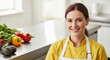 © Inspire Shots Hub - Close-up of a smiling woman in yellow chef jacket and white apron, representing culinary profession and healthy eating with vegetables on the table